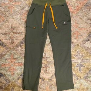 Figs Women’s Technical Collection Scrub bottoms in Olive with Orange Drawstrings